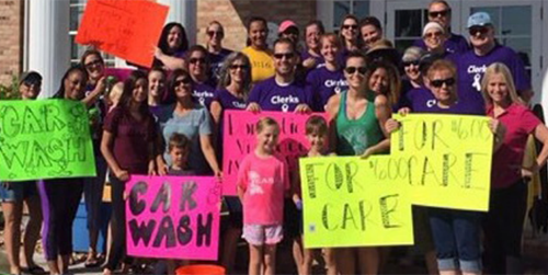 Clerk's office staff at fundraising car wash for Center Abuse and Rape Emergencies