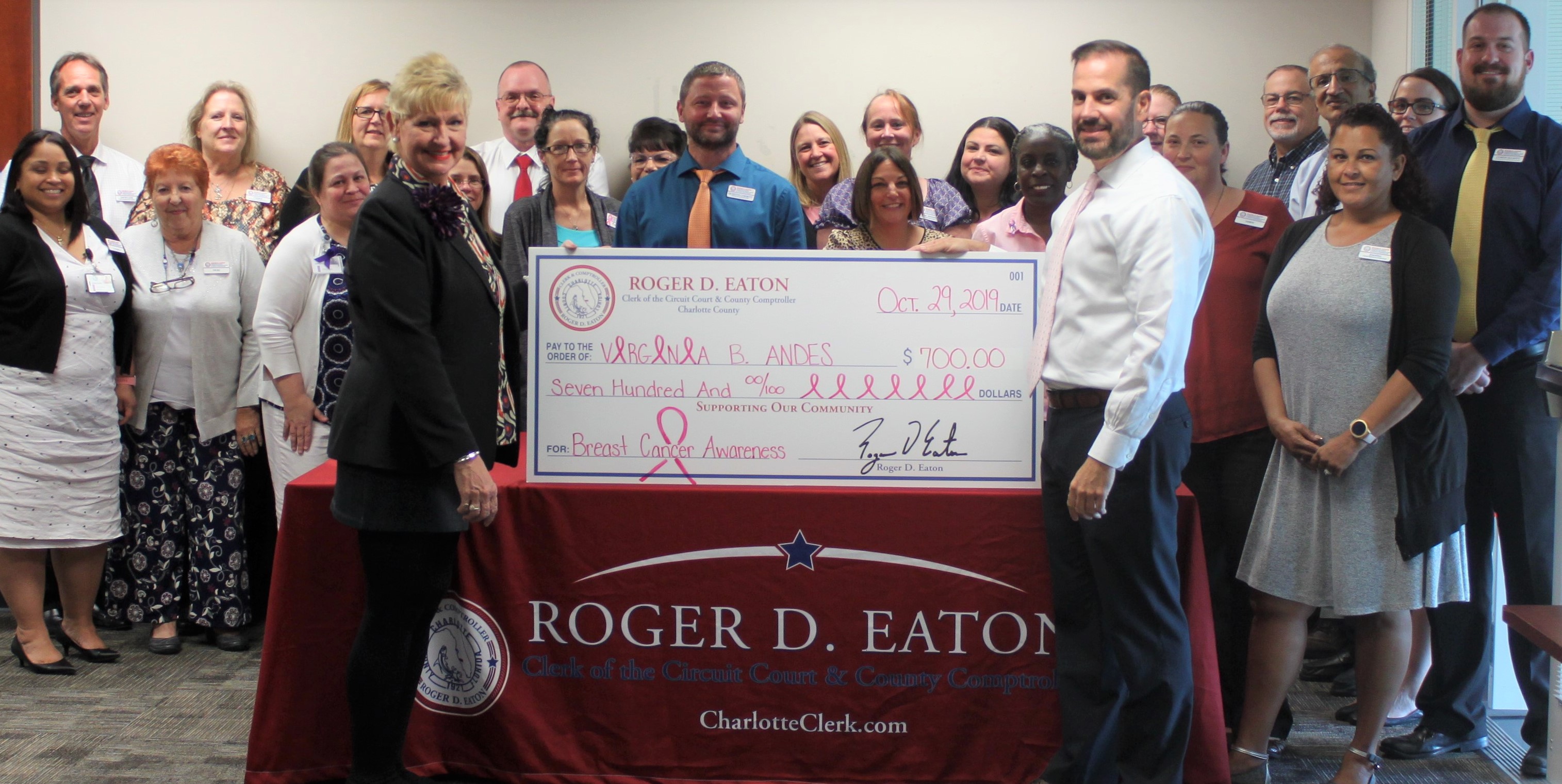 Roger D. Eaton, Clerk of the Circuit Court and County Comptroller and staff presents check to the Virginia B. Andes Volunteer Mammogram Program